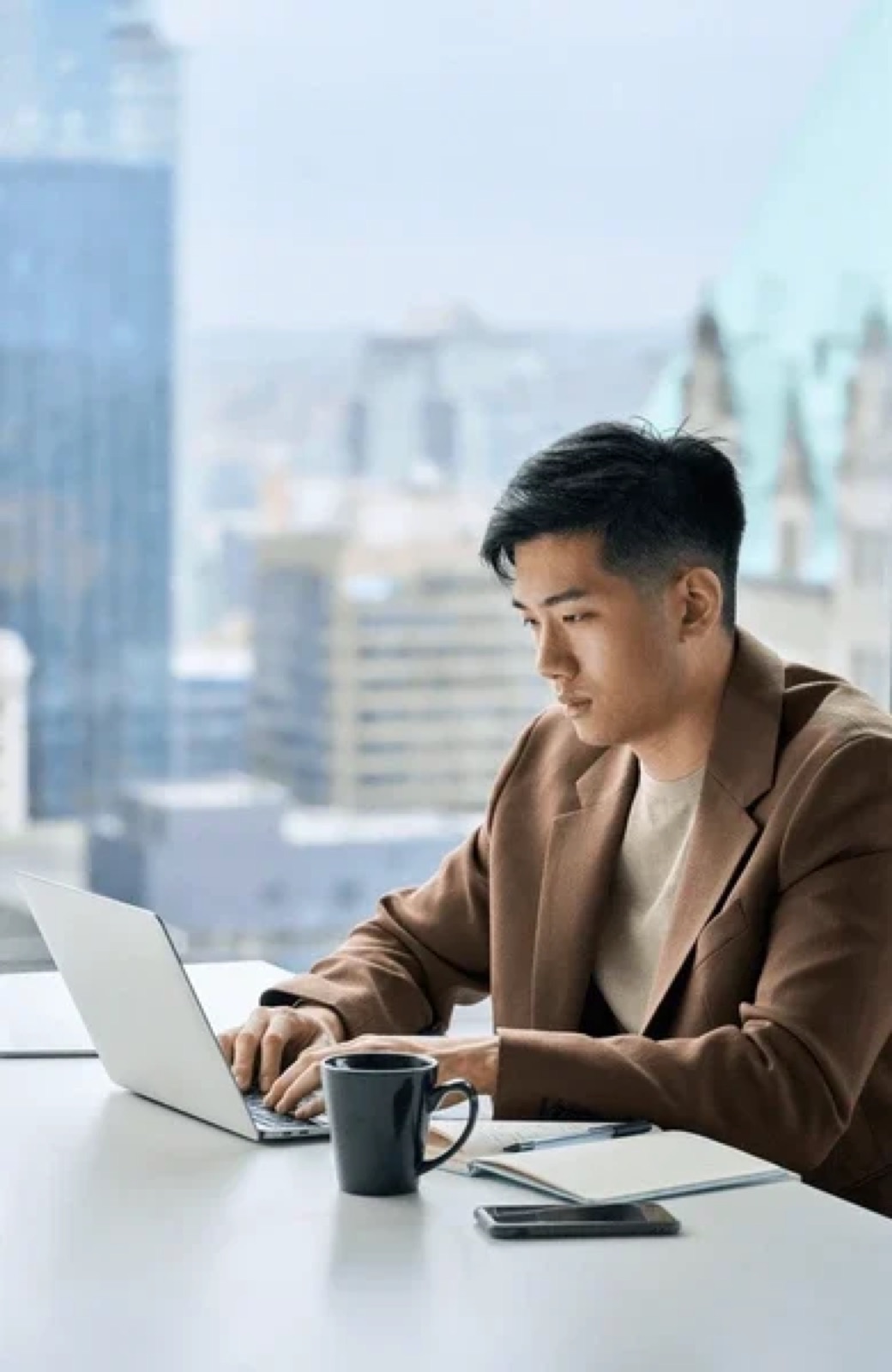 An investor reviewing an offering at their desk
